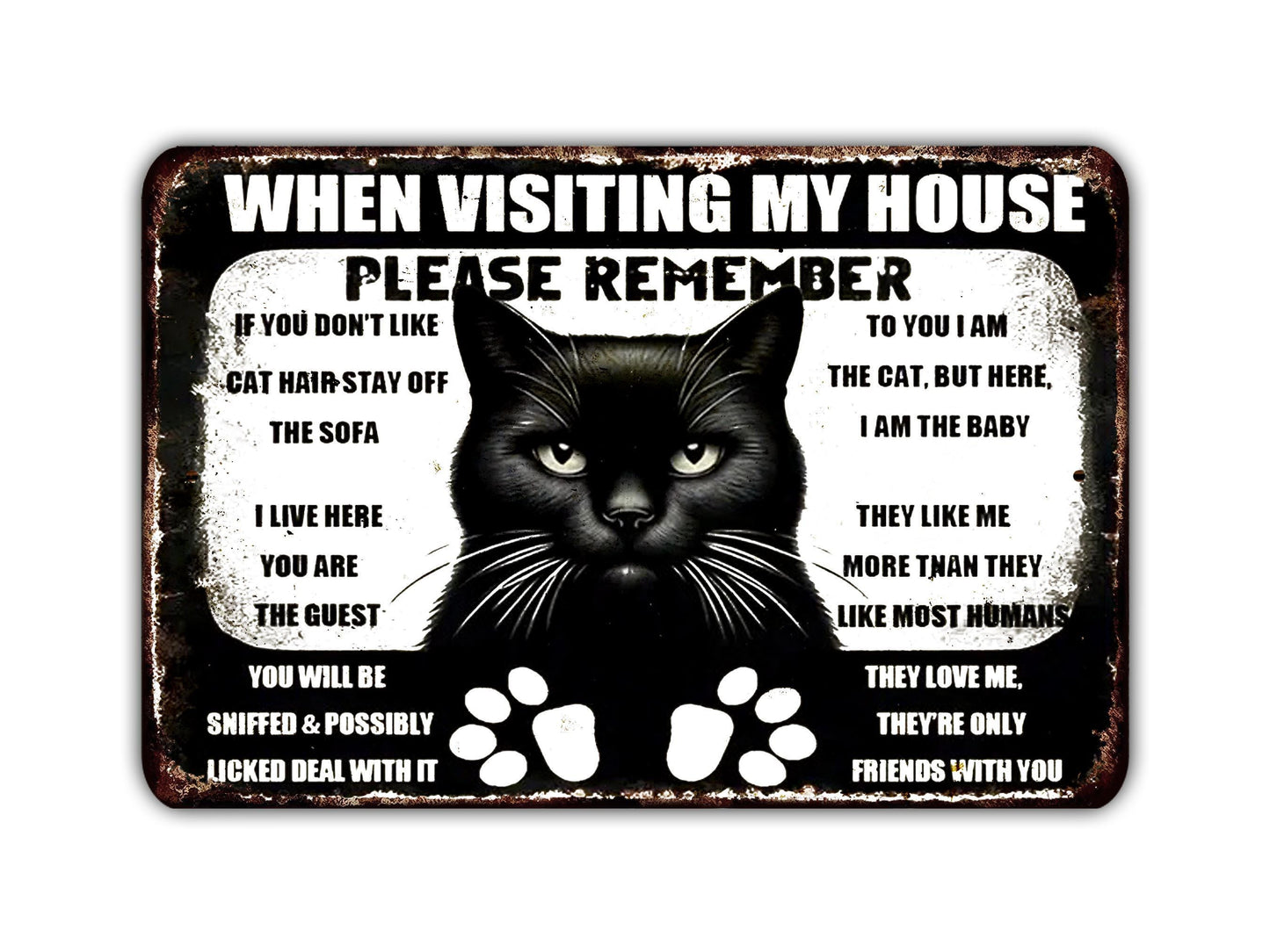a metal sign with a black cat saying when visiting my house please remember