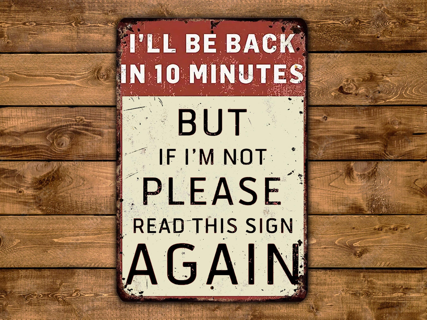 a sign on a wooden wall that says i'll be back in 10 minutes