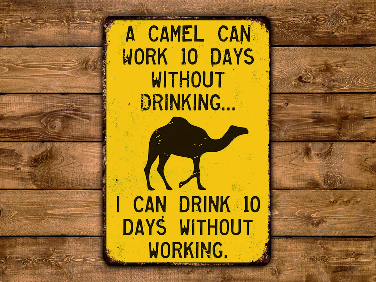 A yellow sign with a camel and text stating "A camel can work 10 days without drinking... I can drink 10 days without working."