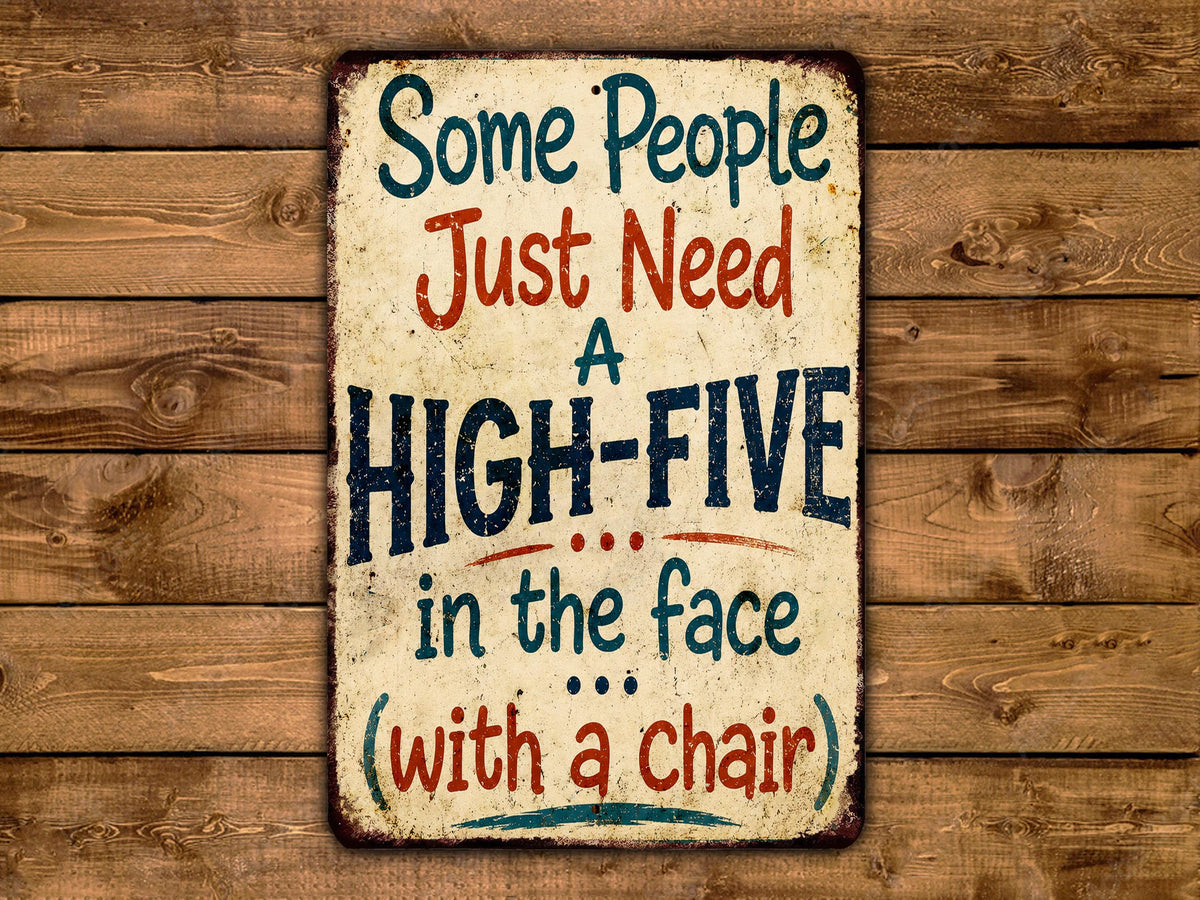 a sign with the text "Some People Just Need a High-Five in the Face with a Chair" written on it.