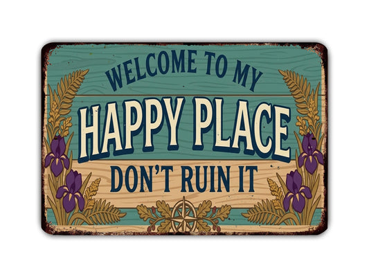 a vintage-style sign with the text "Welcome to my happy place don't ruin it" in a decorative font.
