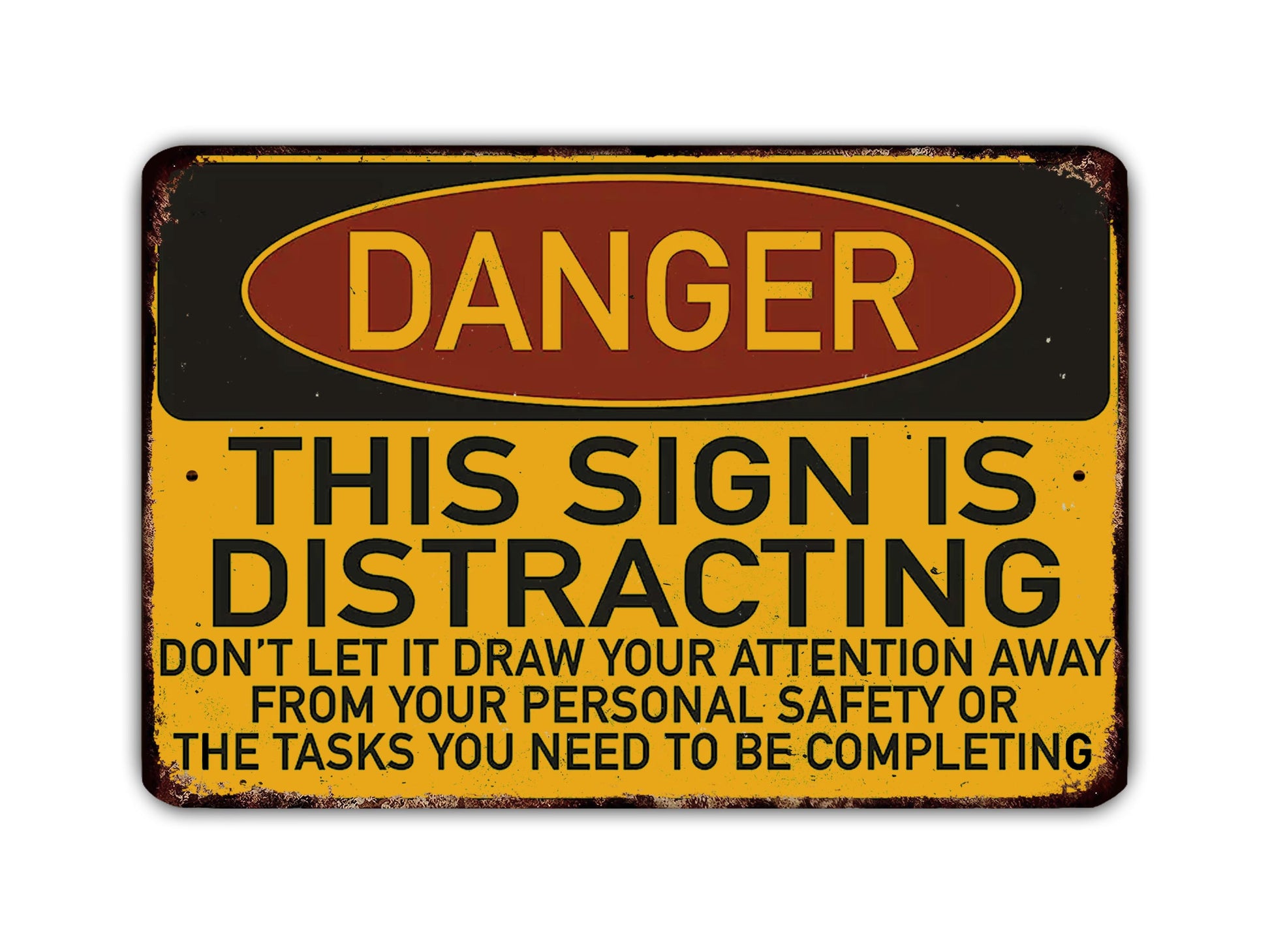 a sign with the word "DANGER" in large letters, indicating a warning or hazard. The sign also contains a message that says "THIS SIGN IS DISTRACTING" and advises not to draw attention away from personal safety or the tasks that need to be completed.