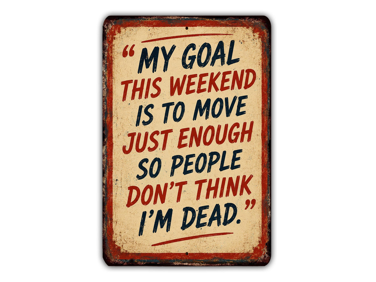 a sign with a humorous message that reads "My goal this weekend is to move just enough so people don't think I'm dead."