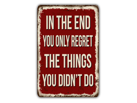 a red sign that says in the end you only regret the things you didn '