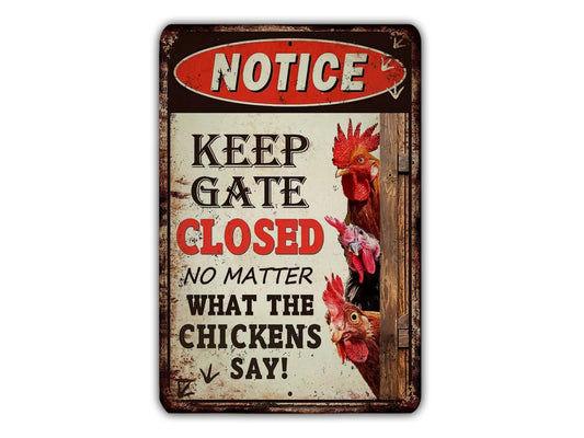 a sign that says notice keep gate closed no matter what the chickens say