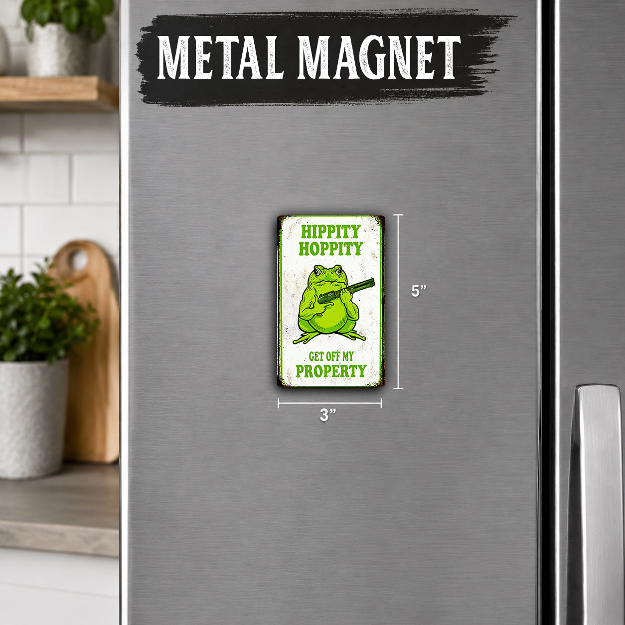 a small green frog magnet on a refrigerator, with the text "Hippity Hooty Get off my Property" displayed on it.