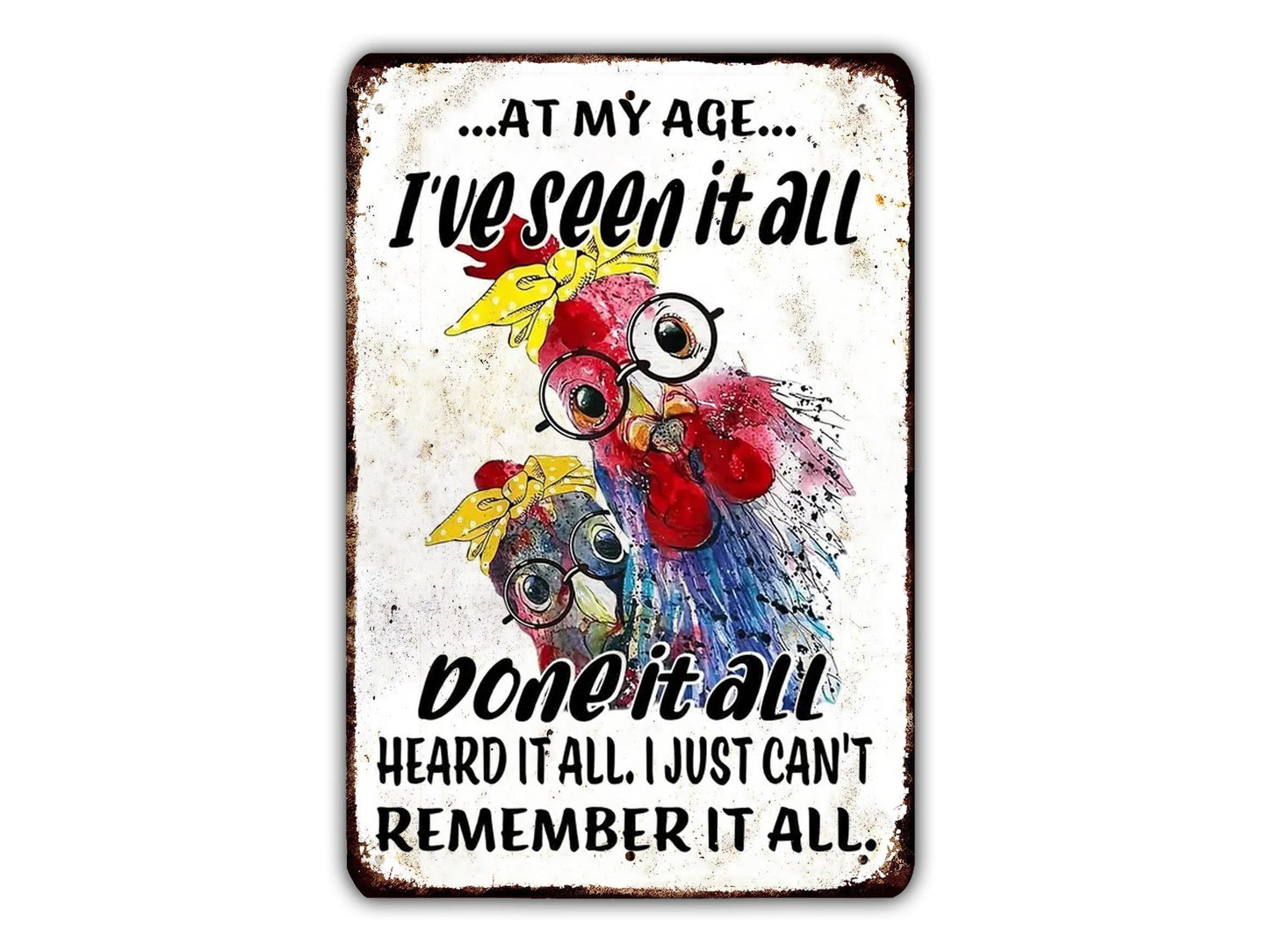 The image is a sign with a humorous message about age and memory, featuring a pair of colorful birds with large eyes and a comical expression.
