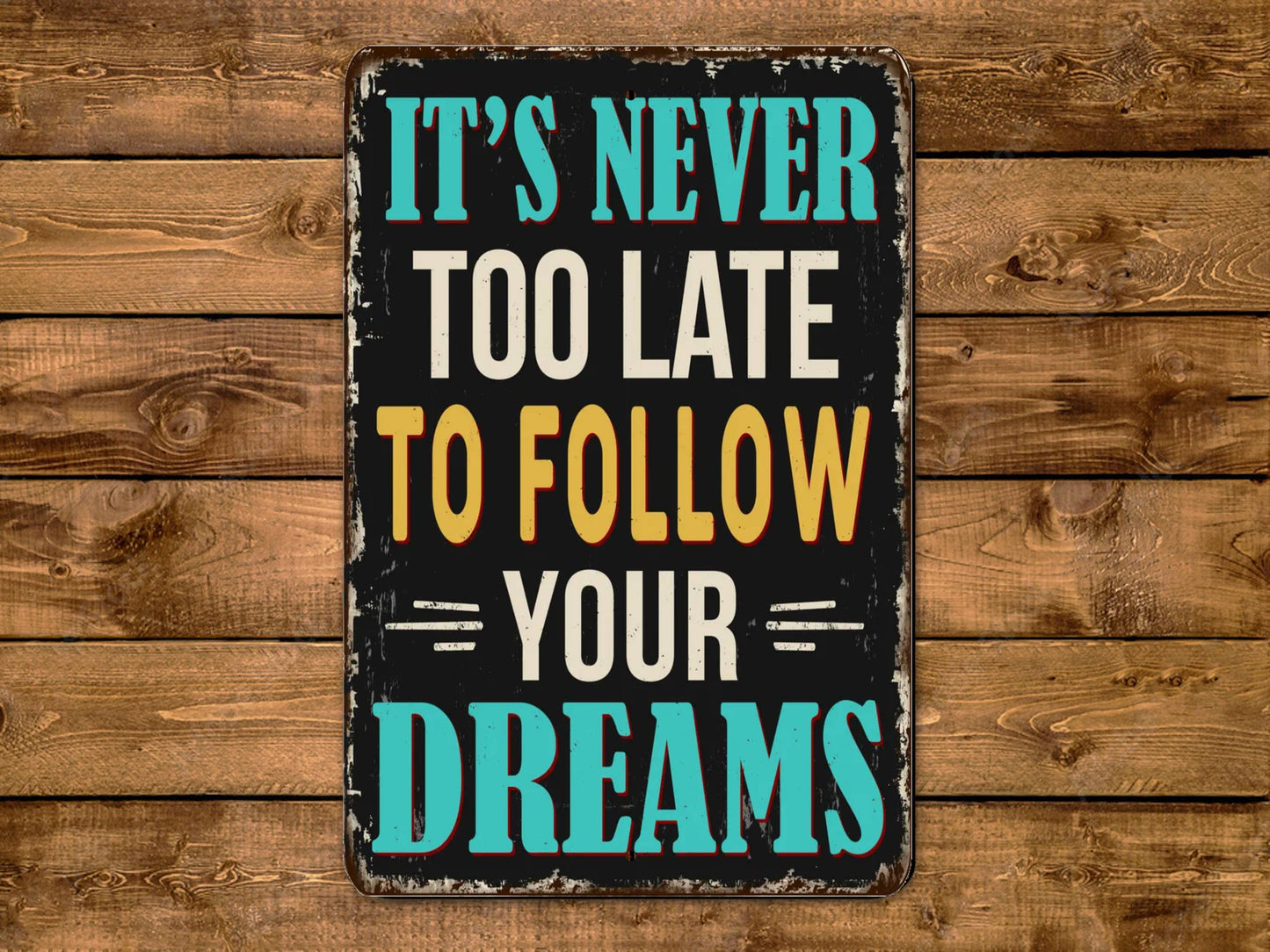 a sign that says it's never too late to follow your dreams