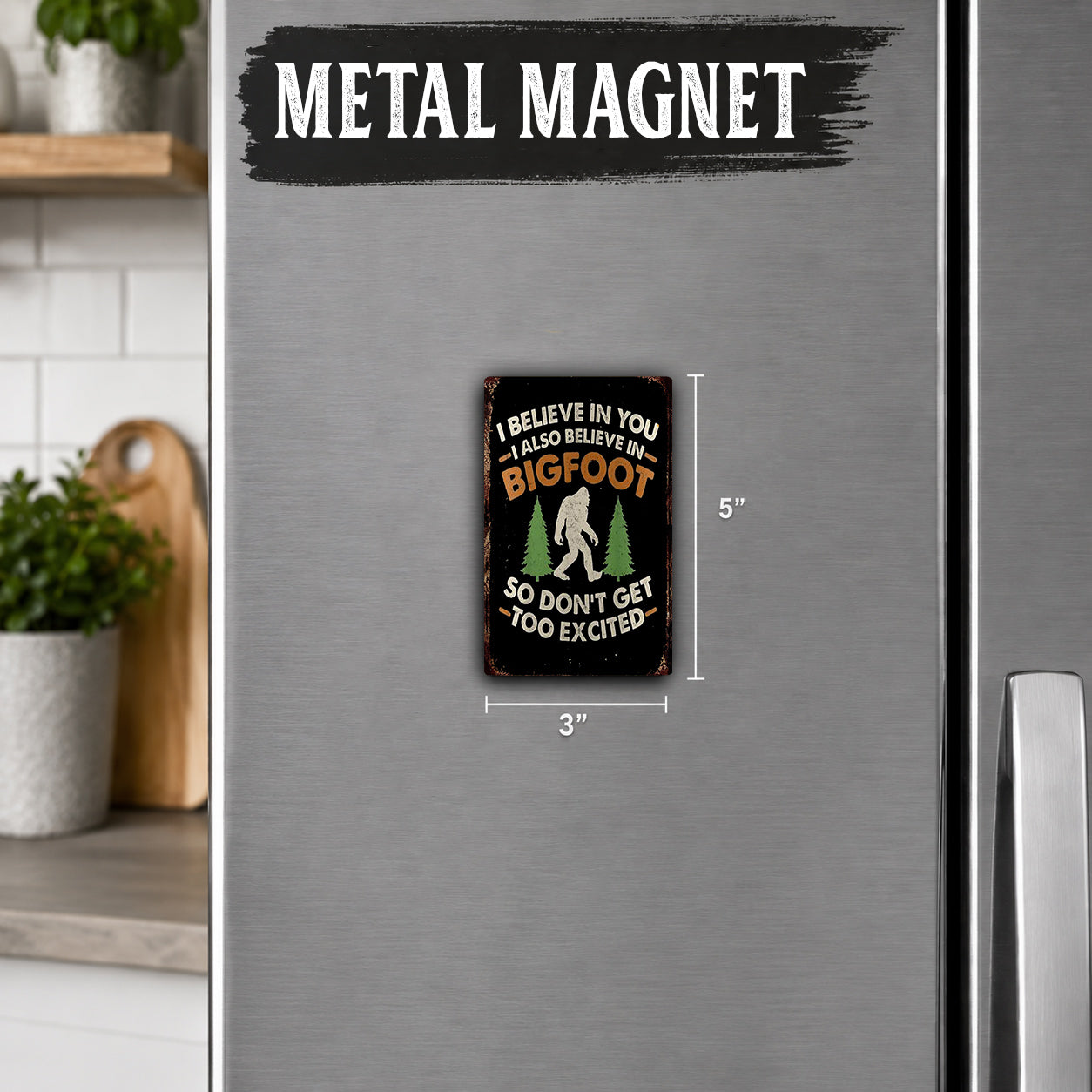 a small metal magnet with a humorous text and a silhouette of a Sasquatch.