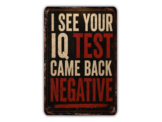 a sign with the text "I SEE YOUR IQ TEST CAME BACK NEGATIVE" in a distressed, vintage style.