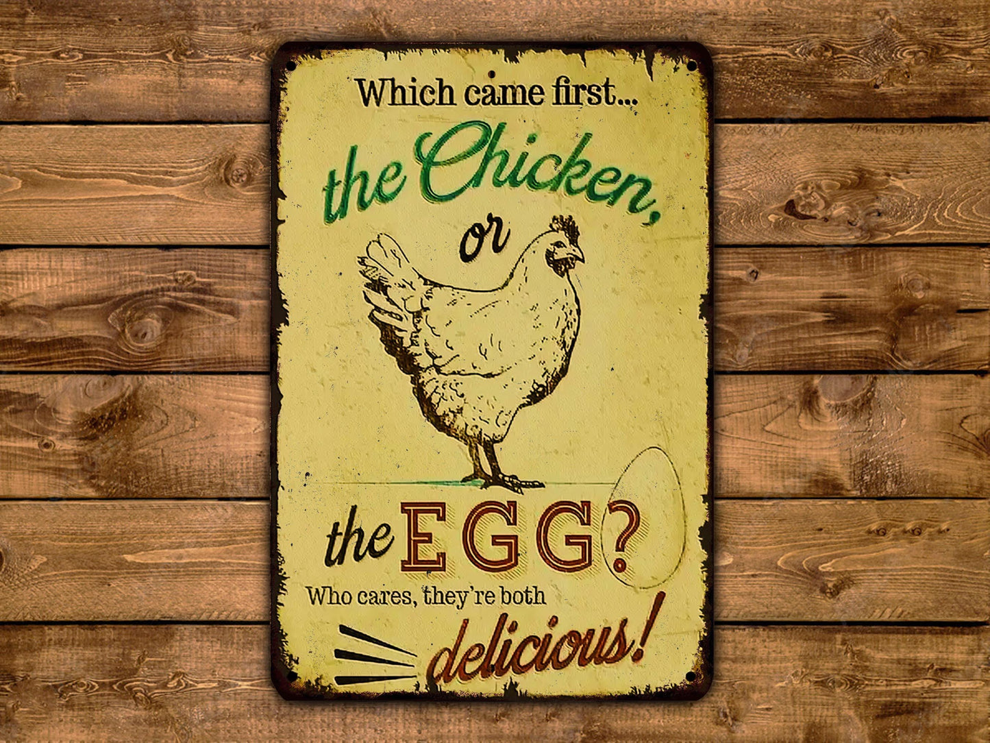 a sign with a chicken and an egg, asking which came first: the chicken or the egg.