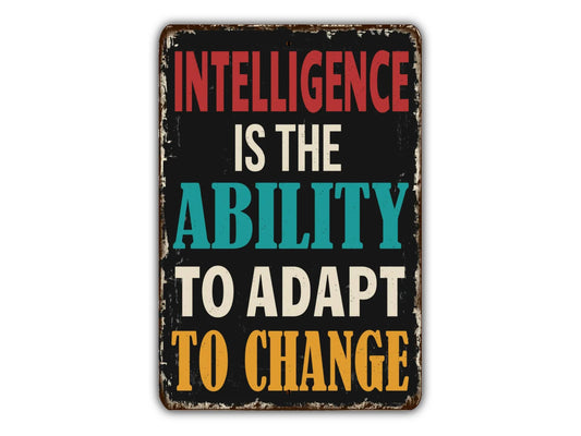 a sign that says,'intelligence is the ability to adapt to change '