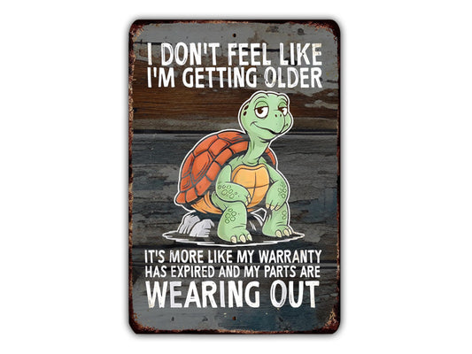 a cartoon turtle with the text "I DON'T FEEL LIKE I'M GETTING OLDER" and "IT'S MORE LIKE MY WARRANTY HAS EXPIRED AND MY PARTS ARE WEARING OUT" written below it.
