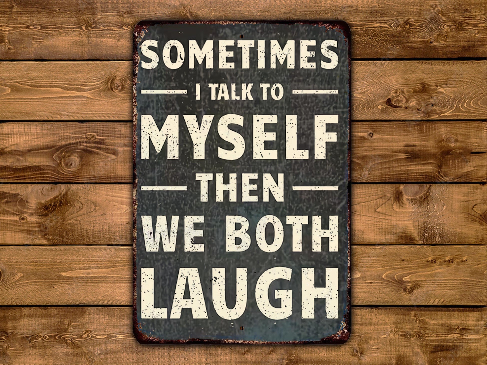 a sign with the text "Sometimes I talk to myself then we both laugh" against a wooden background.