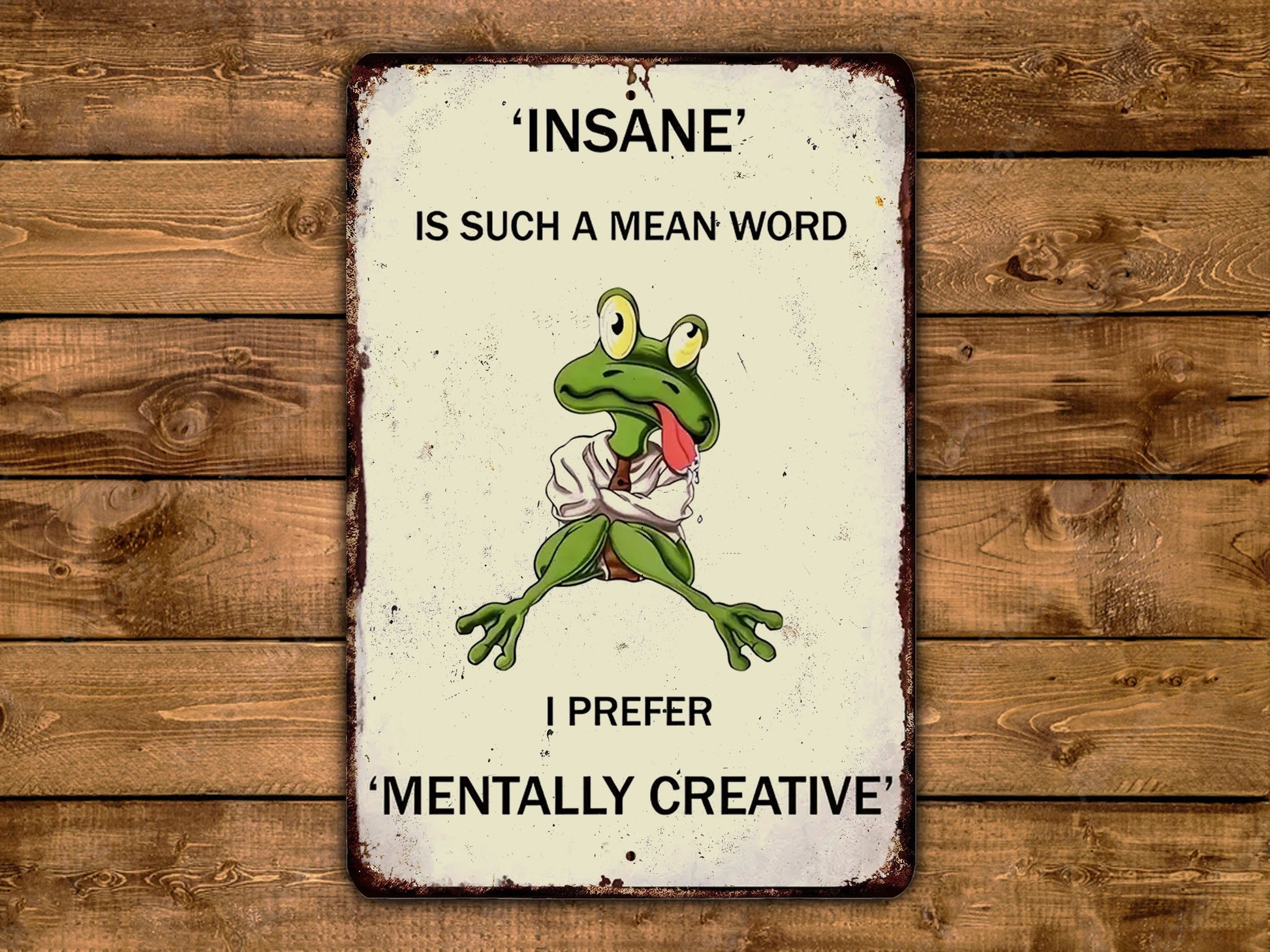 a sign on a wooden wall that says, insane is such a mean word