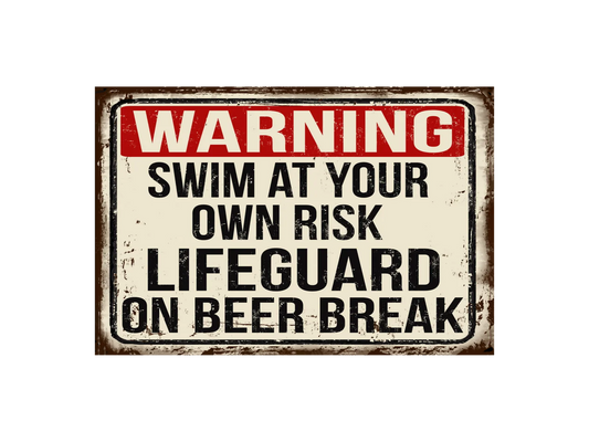 a sign warning of swimming at your own risk lifeguard on beer break