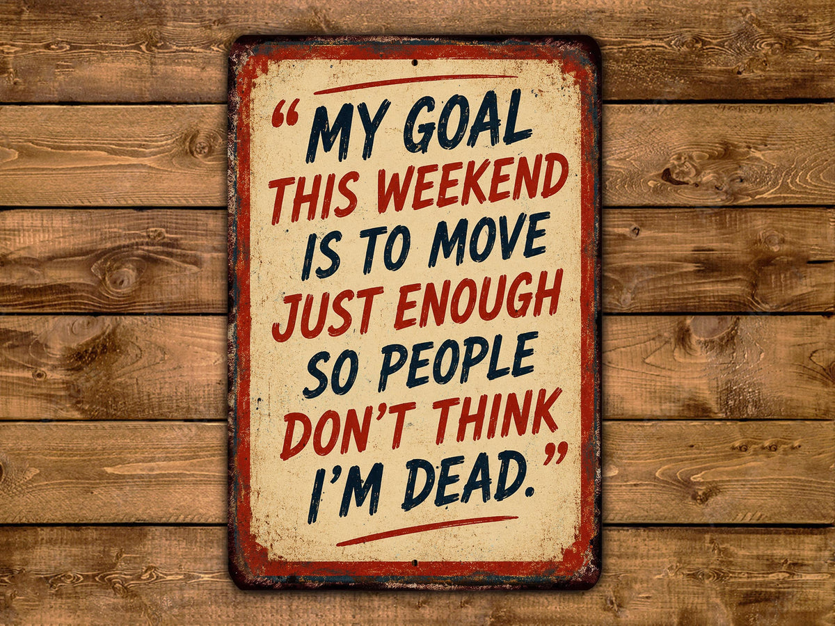 a sign with a humorous message about a weekend goal.