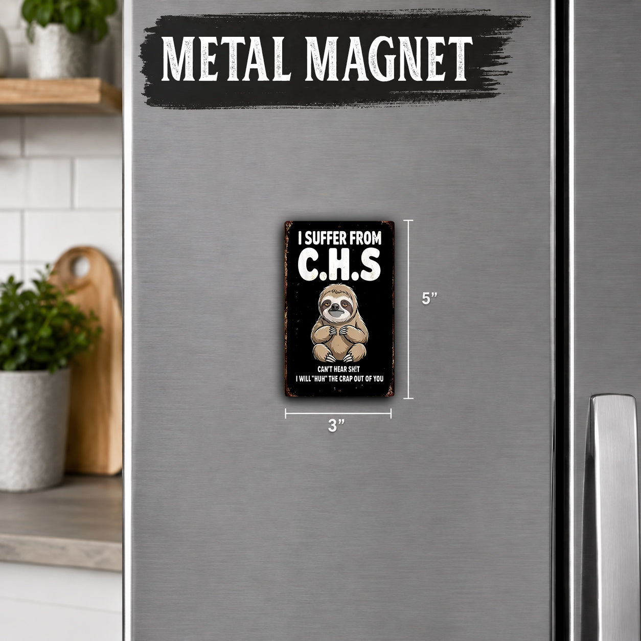a metal refrigerator with a small metal magnet on it. The magnet has a sloth on it and says "I Suffer From C.H.S." and "Can't Handle It, Help Me Get Out of Here."