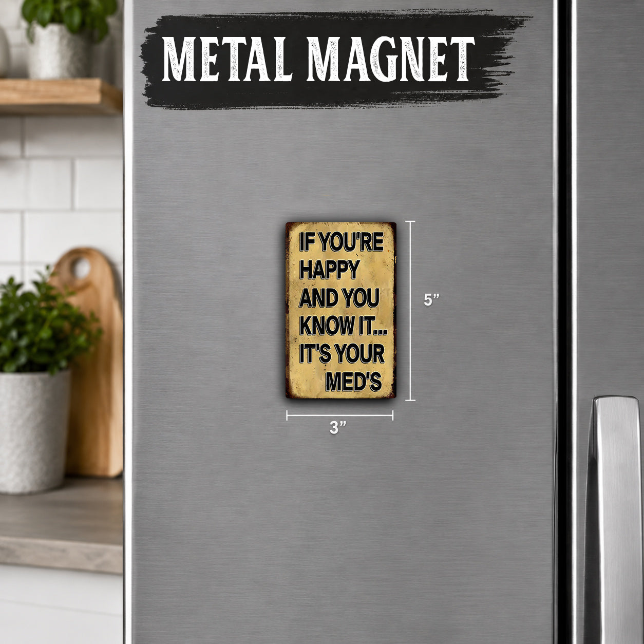 a small, vintage-style metal magnet with a humorous message on it.