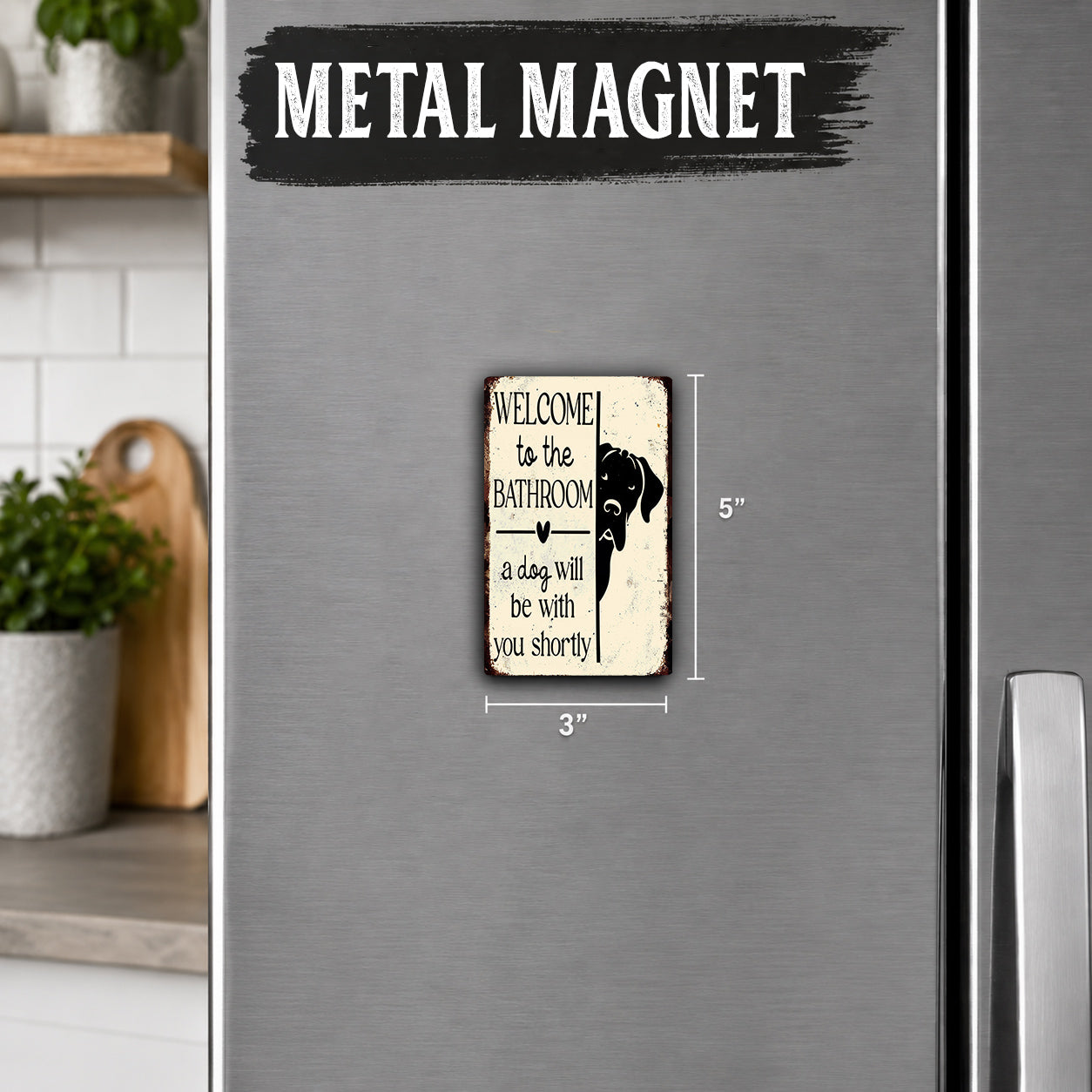 a small metal sign on a refrigerator that reads "Welcome to the Bathroom a dog will be shortly".