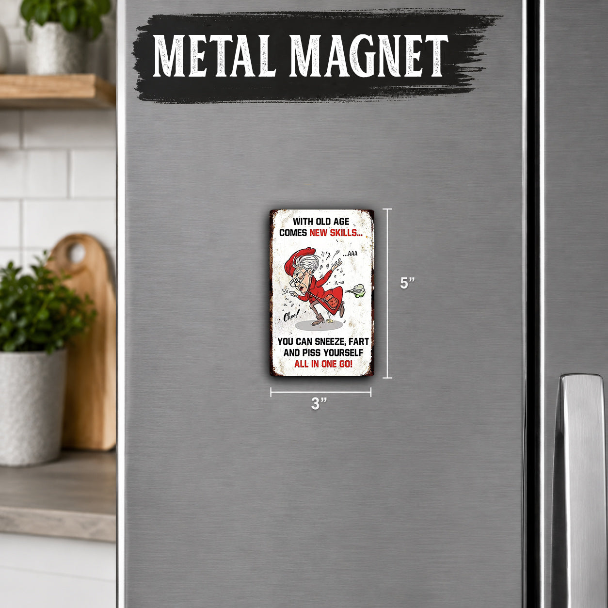 a small metal magnet with a humorous message on it, placed on a refrigerator.