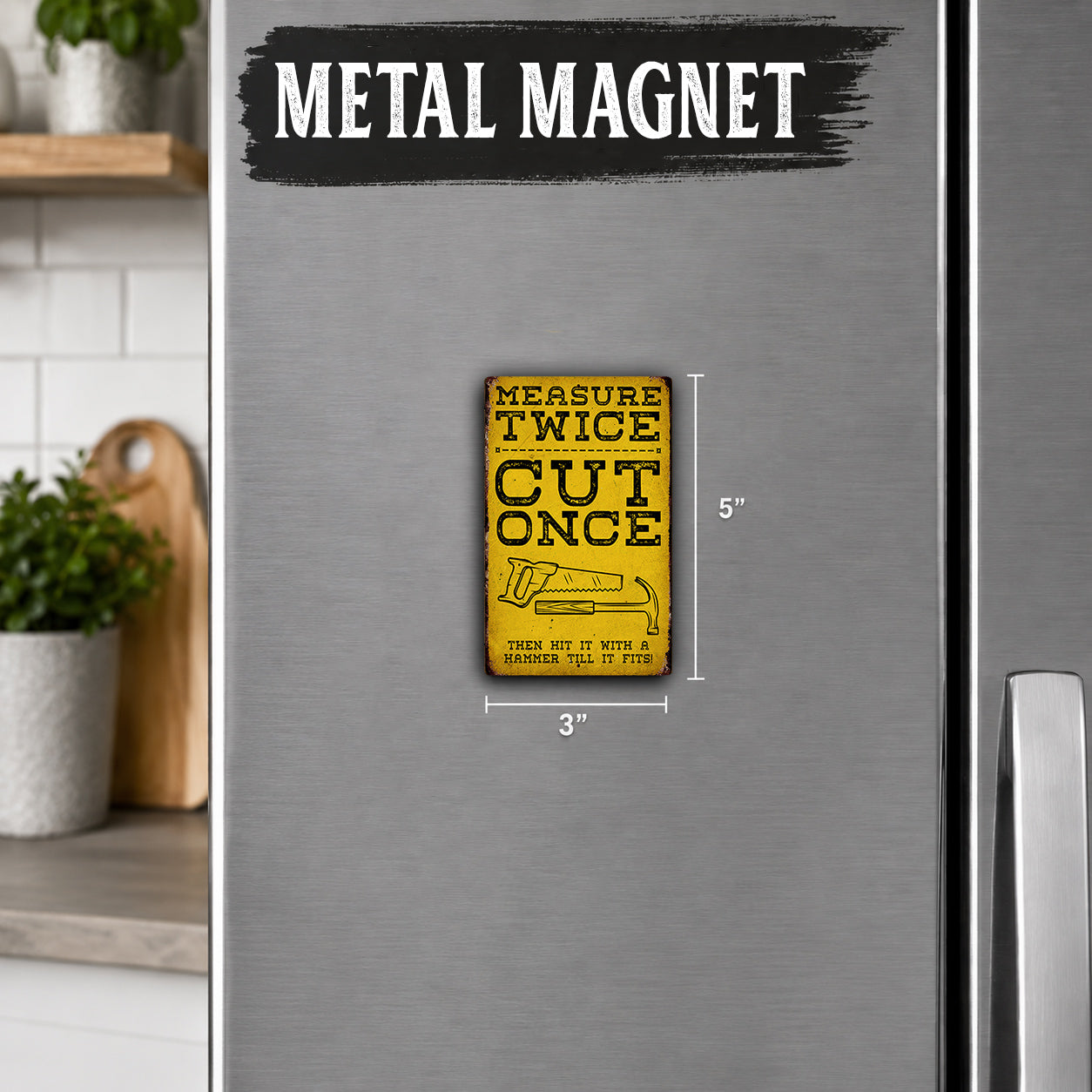 a metal magnet with a humorous message about measuring twice and cutting once.