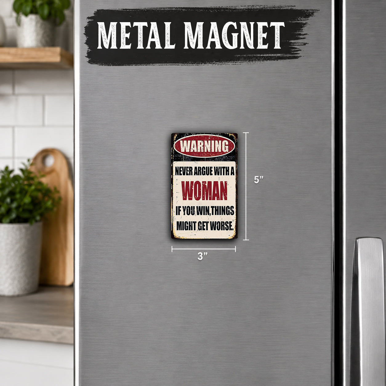 a metallic refrigerator with a warning sign on it.