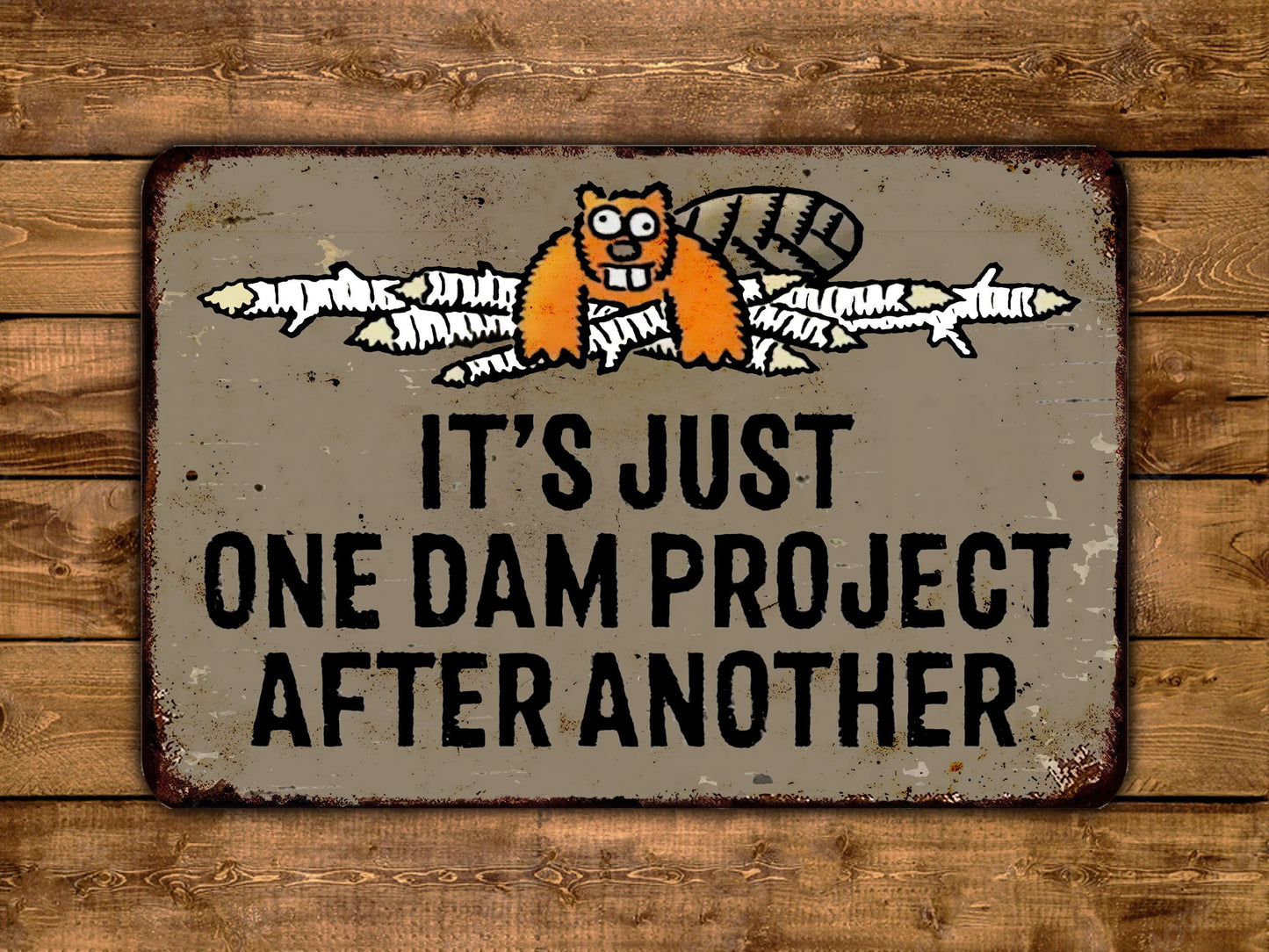 a sign on a wooden wall that says it's just one dam project after