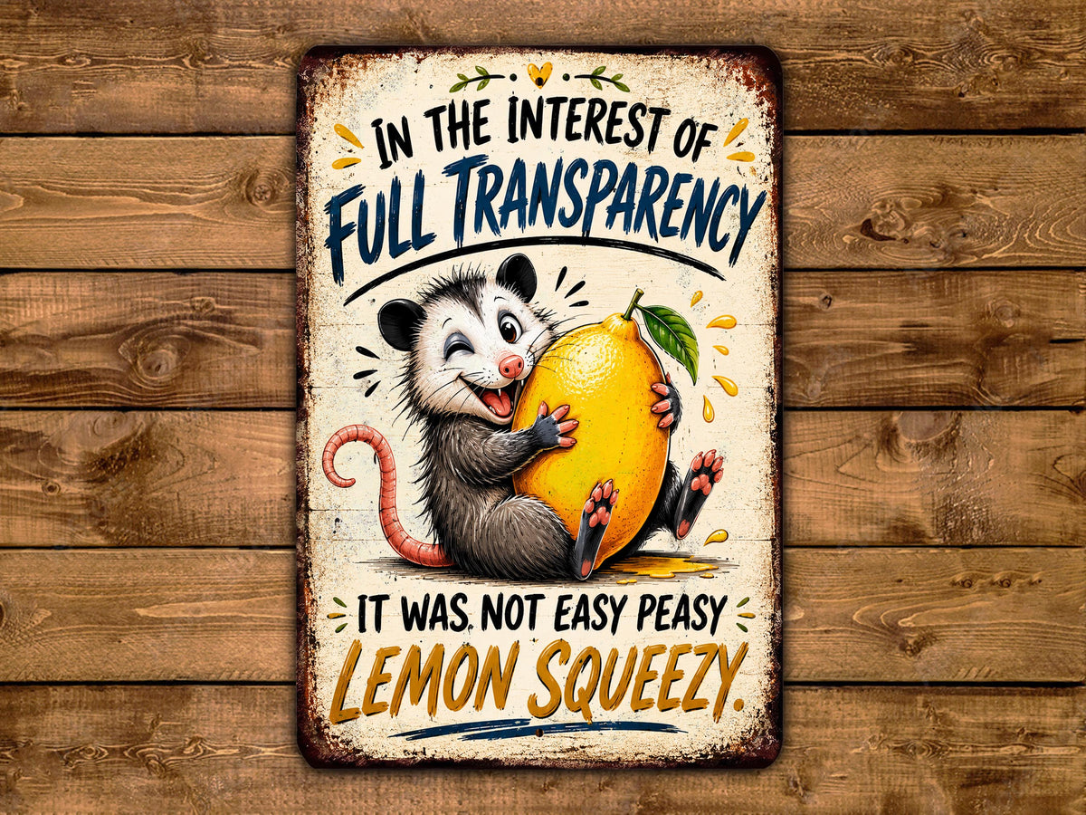 A vintage-style metal sign with a cartoon opossum holding a lemon, accompanied by text that reads "In the interest of full transparency, it was not easy peasy lemon squeezy".
