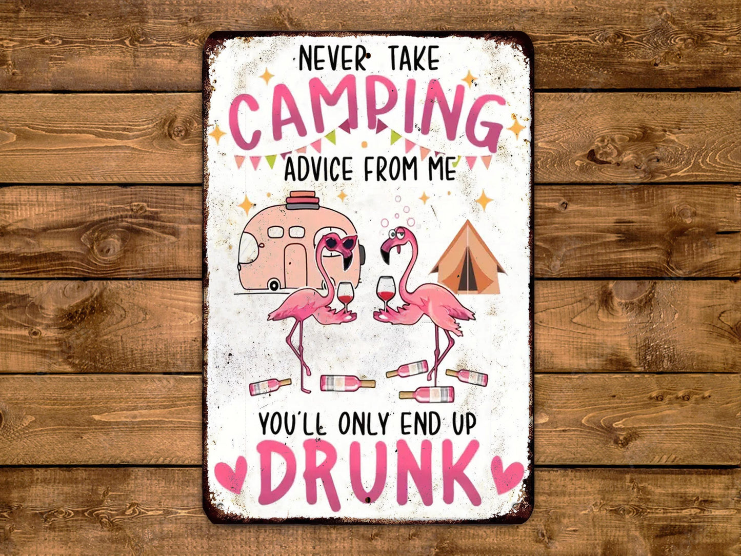 The image is a humorous sign with a cartoon flamingo and camping-related elements, accompanied by the text "Never take camping advice from me, you'll only end up drunk".