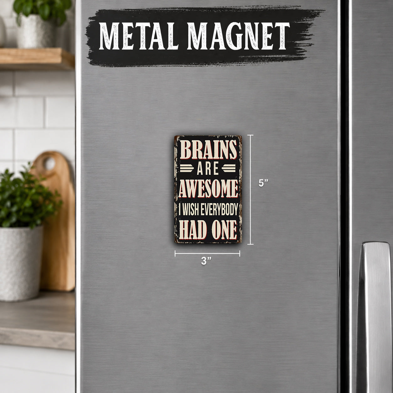 a small metal magnet with the text "Brains are Awesome I wish everyone had one" on it.