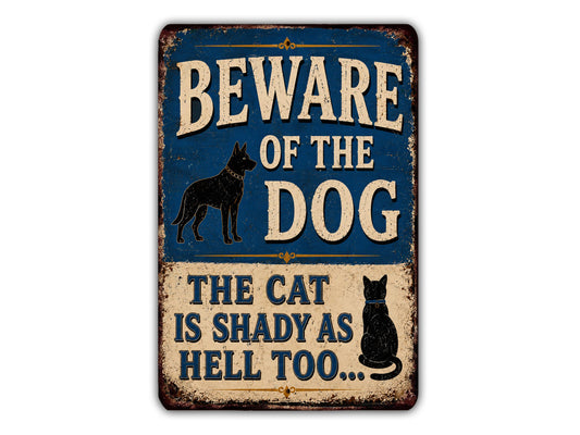 a sign with the text "BEWARE OF THE DOG" and "THE CAT IS SHADY AS HELL TOO...".