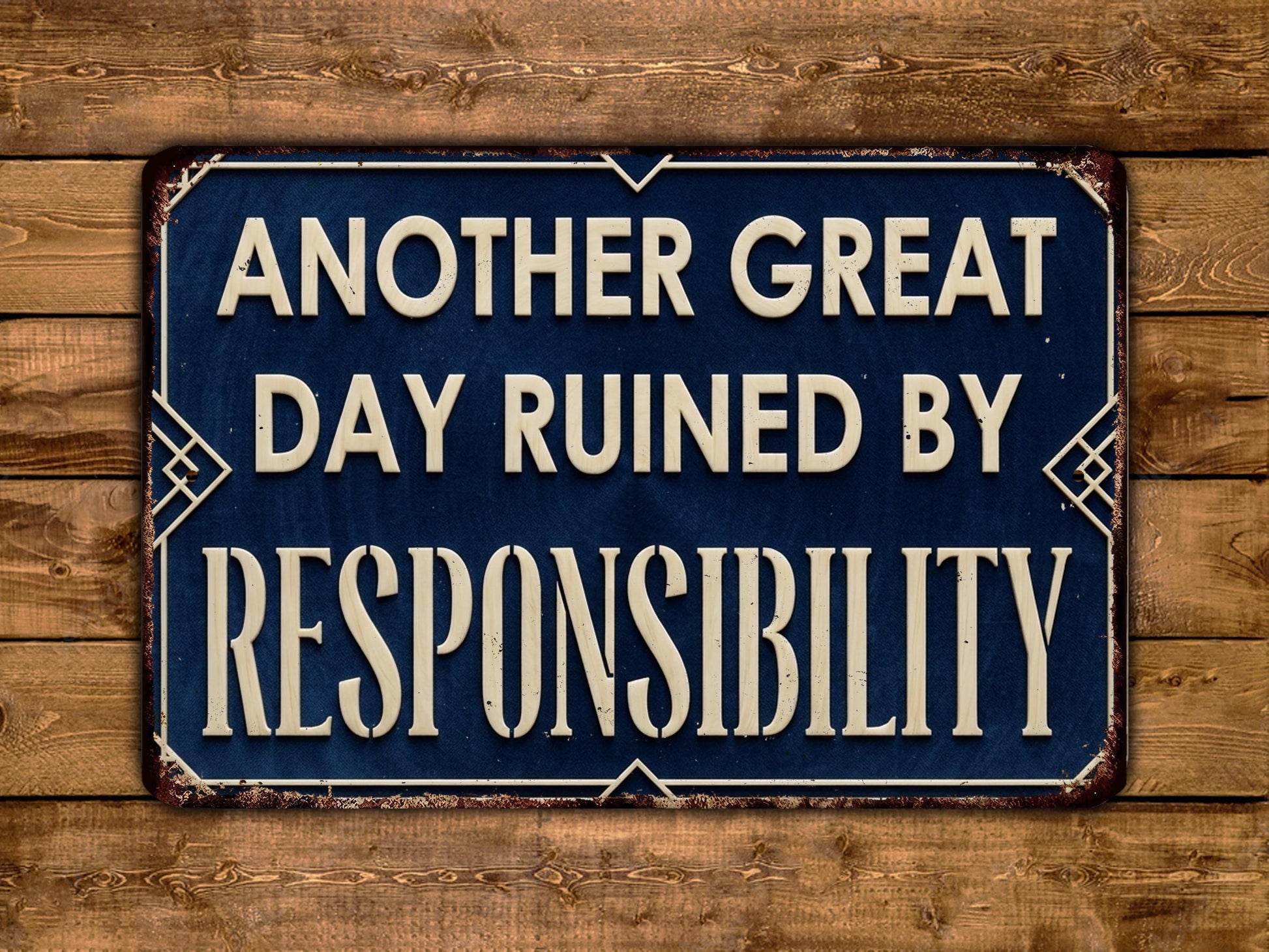 a sign with the text "Another Great Day Ruined by Responsibility" against a wooden background.