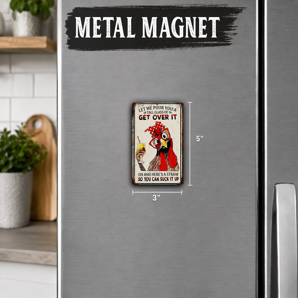 a small metal magnet with a cartoon image of a chicken and a message encouraging people to get over something.