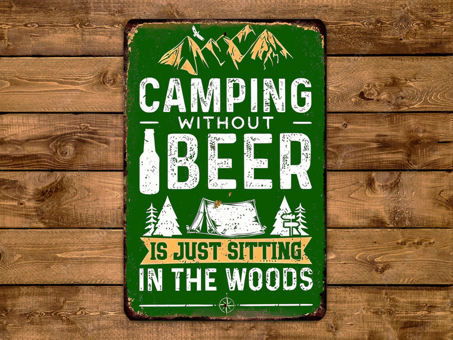 a vintage-style sign with the text "CAMPING WITHOUT BEER IS JUST SITTING IN THE WOODS" against a green background with a mountain and camping scene illustration.