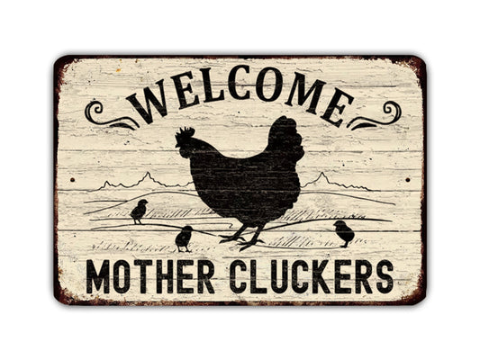 A sign with the text "WELCOME MOTHER CLUCKERS" and a silhouette of a chicken, along with three smaller chickens, indicating a welcoming message for mother cluckers.