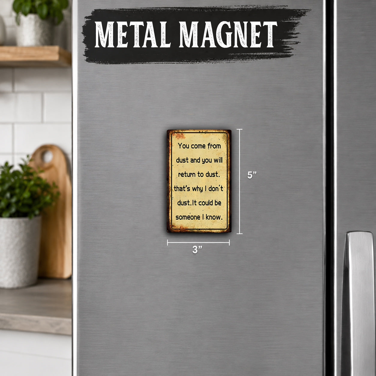 a small, rectangular magnet with a humorous message on it, placed on a refrigerator.