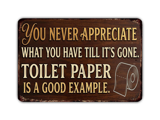 a humorous sign that reads "You never appreciate what you have till it's gone. Toilet paper is a good example."