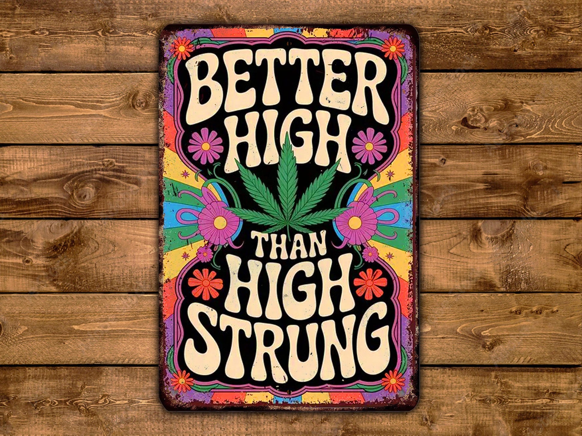 a colorful, vintage-style sign with the text "Better High Than High Strung" displayed prominently.