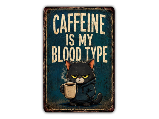 a black cat holding a cup of coffee, with the text "CAFFEINE IS MY BLOOD TYPE" written above it.
