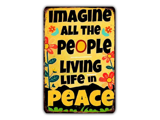 a sign with the text "IMAGINE ALL THE PEOPLE LIVING LIFE IN PEACE" written on it.