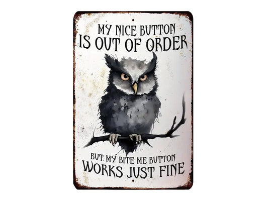 an owl with a sign that reads "My nice button is out of order but my bite me button works just fine".