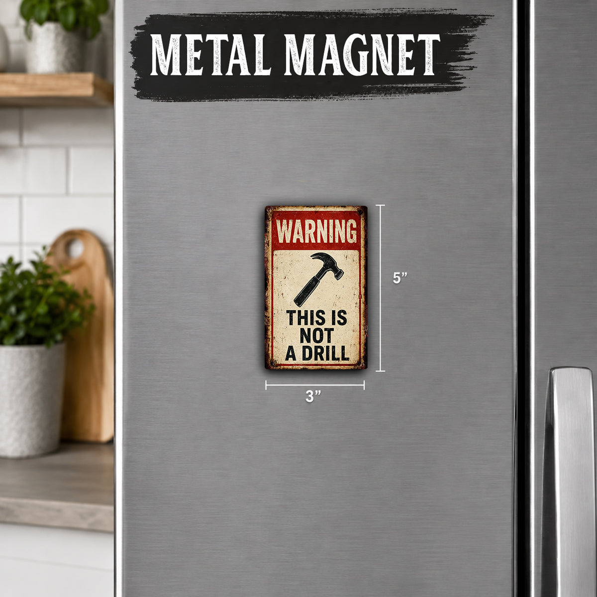 a metallic refrigerator with a warning sign attached to it. The sign reads "This is not a drill" and is approximately 5 inches in size.