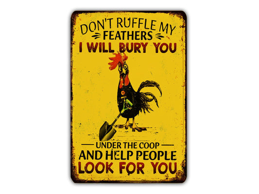 The image is a humorous sign featuring a rooster holding a shovel, with the text "Don't ruffle my feathers, I willbury you under the coop and help people look for you".