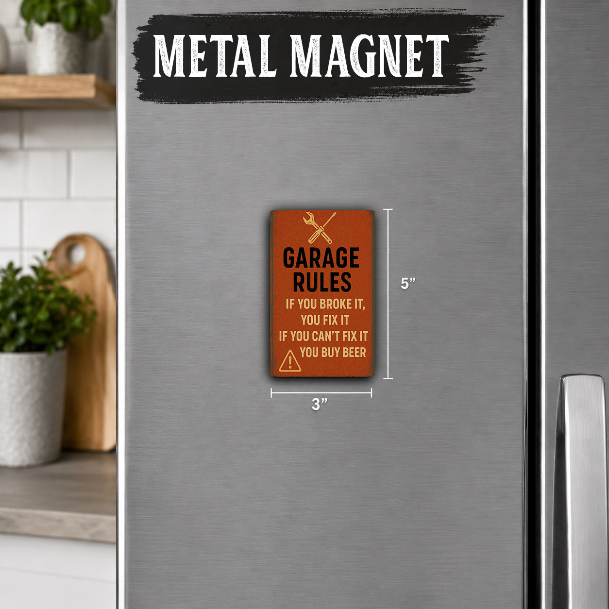 a metallic refrigerator with a warning sign attached to it. The sign reads "Garage Rules" and provides a humorous reminder that if you broke the rules, you could fix it, but if you couldn't, you could buy beer.