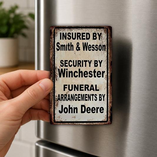 A person's hand is holding a metal sign with text on it, which appears to be a humorous or unconventional message about funeral arrangements.