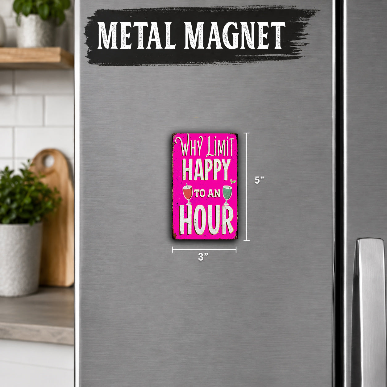 a pink metal magnet with the text "Why limit happy to an hour" on it, placed on a stainless steel refrigerator.