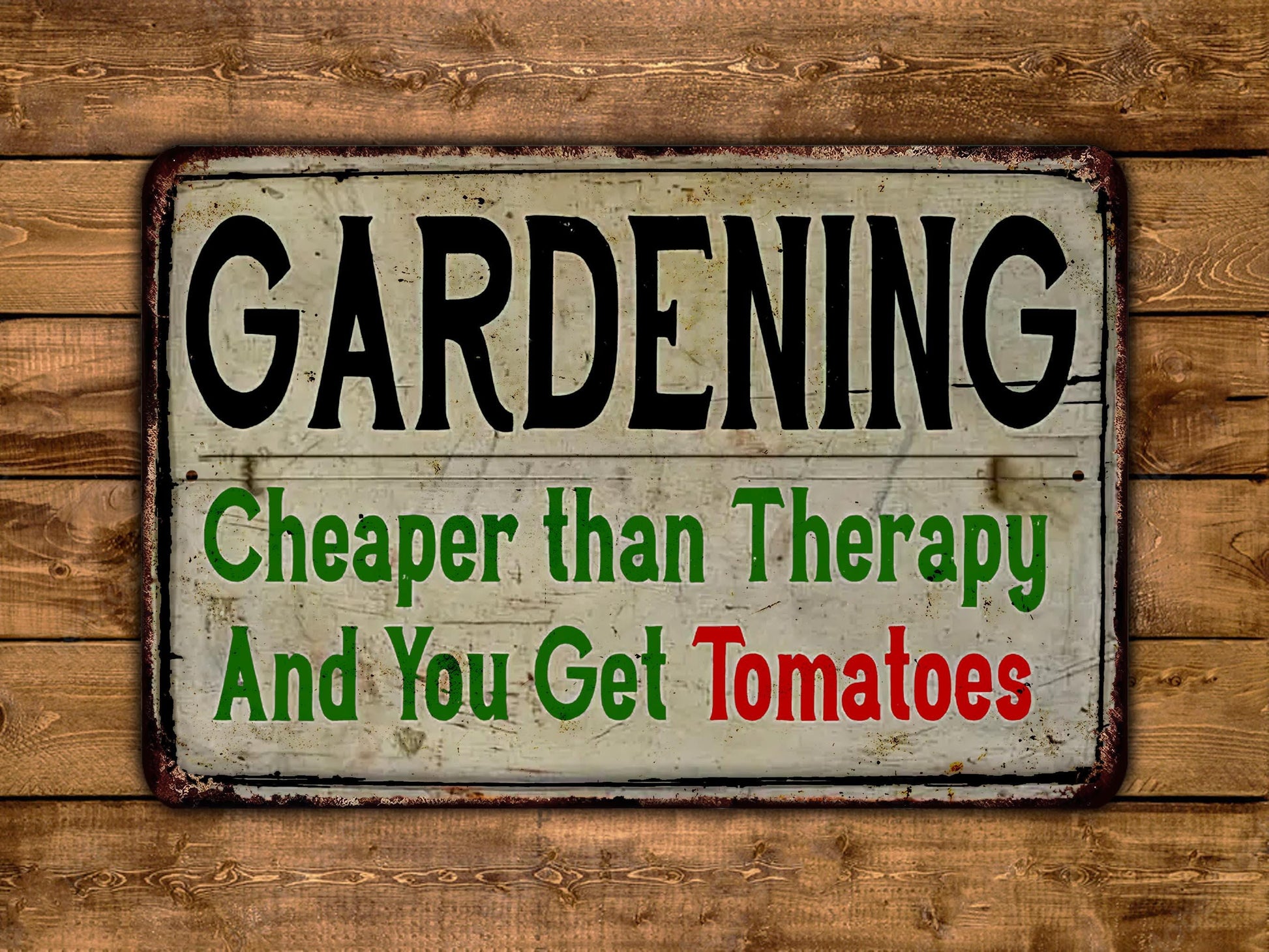 a sign that says gardening is cheaper than therapy and you get tomatoes