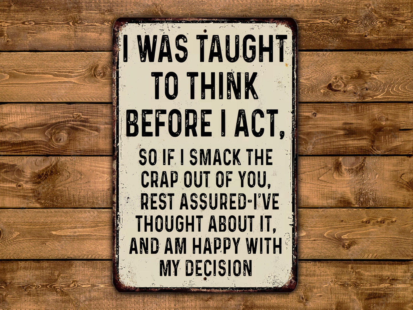 a humorous sign with a wooden background.