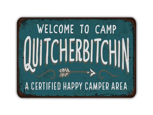 a metal sign that says welcome to a camp